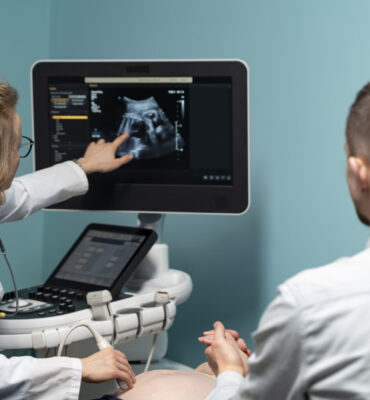 gynecologist-performing-ultrasound-consultation