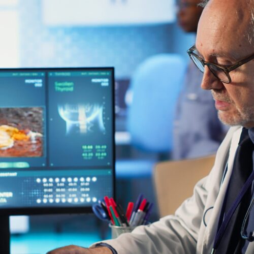 specialist-old-woman-discuss-x-ray-scan-preventive-cancer-medicine-scaled (1)